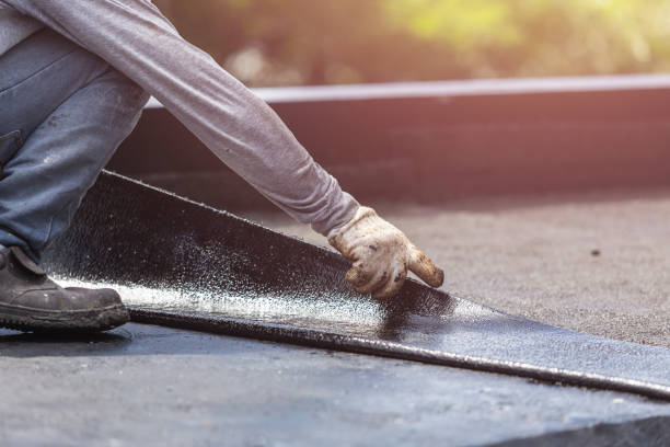 Professional Waterproofing technician working in Newtown, IN